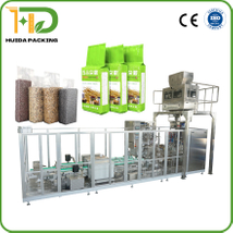 100g-1000g Grains, Beans, Seeds, Coffee, Oats, Nuts Auto Bag Filling Vacuum Sealing Packing Machine Brick Bag Packaging Machine